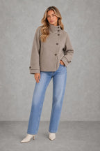 Lola | Asymmetric High-Collar Jacket — lifestyle — Sofia [d61285f2-0bdb-4274-9929-13701f7a5ad9]