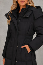 Robyn | Belted Longline Quilted Coat — studio_closeup — Sofia [2c17d632-eff5-4f96-bfe9-0cb45062519a]